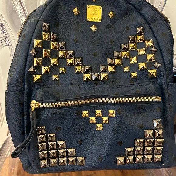 AUTHENTIC blue MCM Stark backpack with studs